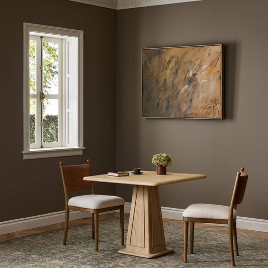 Bishop Bistro Table by Four Hands in light brushed oak. Made from solid oak in a unique style.