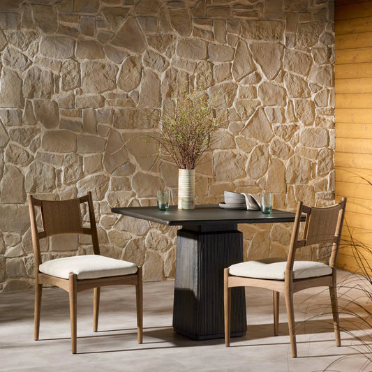 Haddon Outdoor Dining Chair by Four Hands in ellor beige, stained toasted brown-fsc, textured sand. Made from 100% olefin, solid fsc®-certified teak, 100% polyethylene in a unique style.