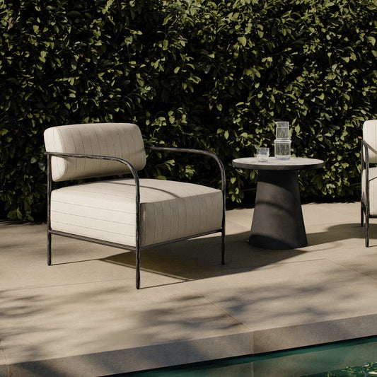 Fenn Outdoor Chair by Four Hands in amalfi natural, hammered black. Made from 100% polypropylene, iron in a unique style.