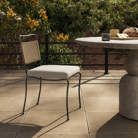 Idalia Outdoor Dining Chair by Four Hands in vergo cream, dark bronze steel, ecru faux hyacinth. Made from 100% polyester, steel, 100% polyethylene in a unique style.