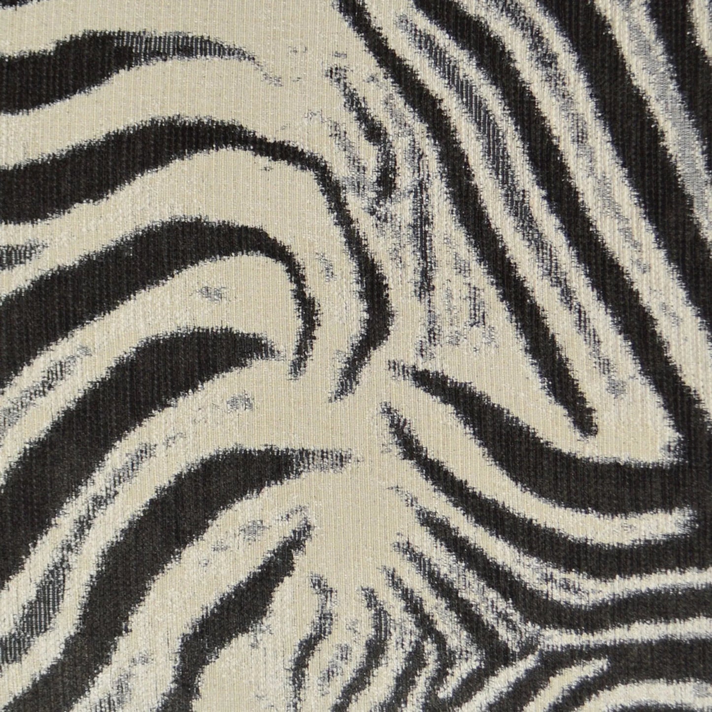 002 SI-2382652 | Closeup | Zebrana Pillow by DV Kap Home in charcoal. Made from 53.97% rayon, 22.49% cotton, 15.30% pir poly, 8.24% pcr poly in a eclectic & global style.
