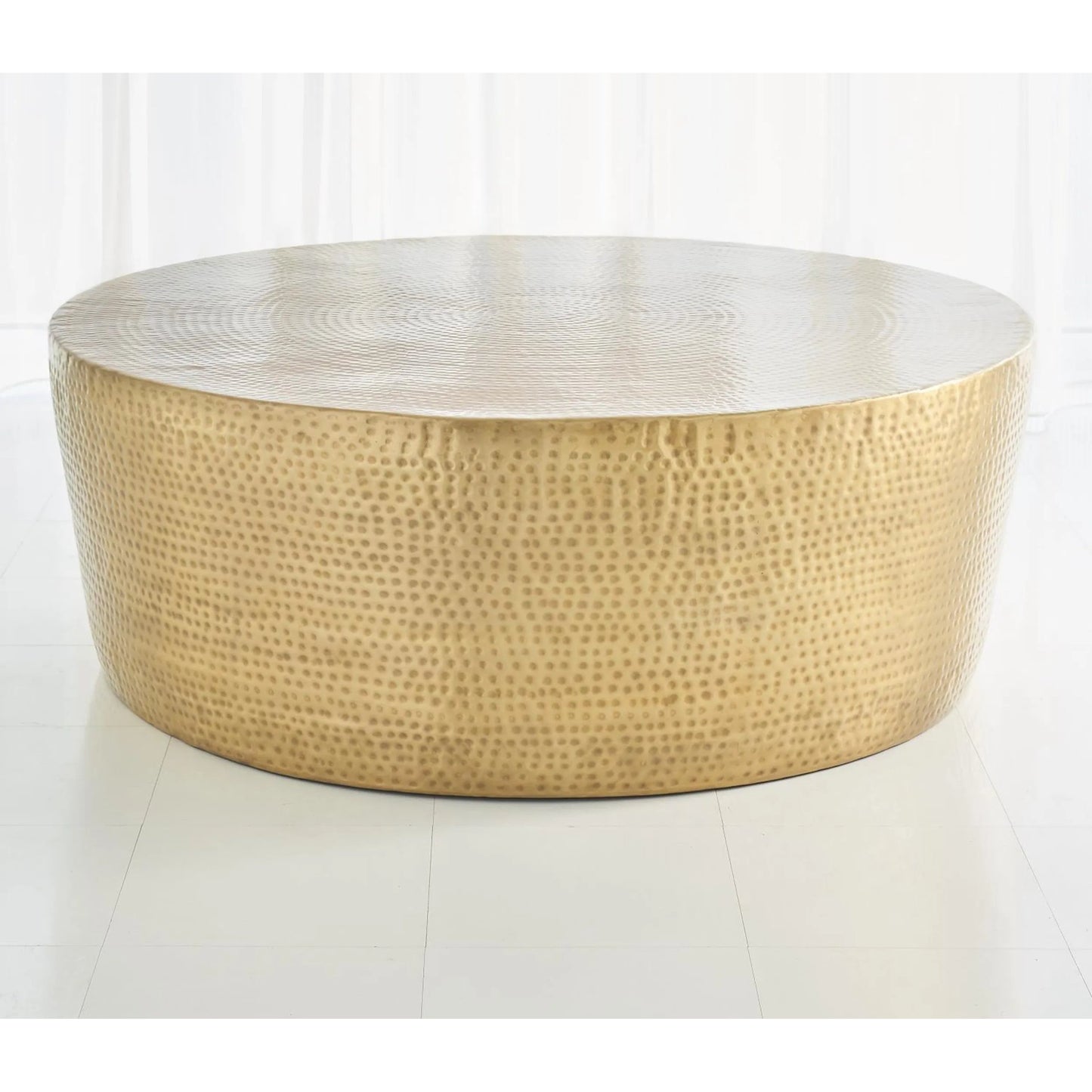 004 SR-701468 | Lifestyle | Izmir Hammered Cocktail Table by Global Views. Made from brass in a eclectic & global style.