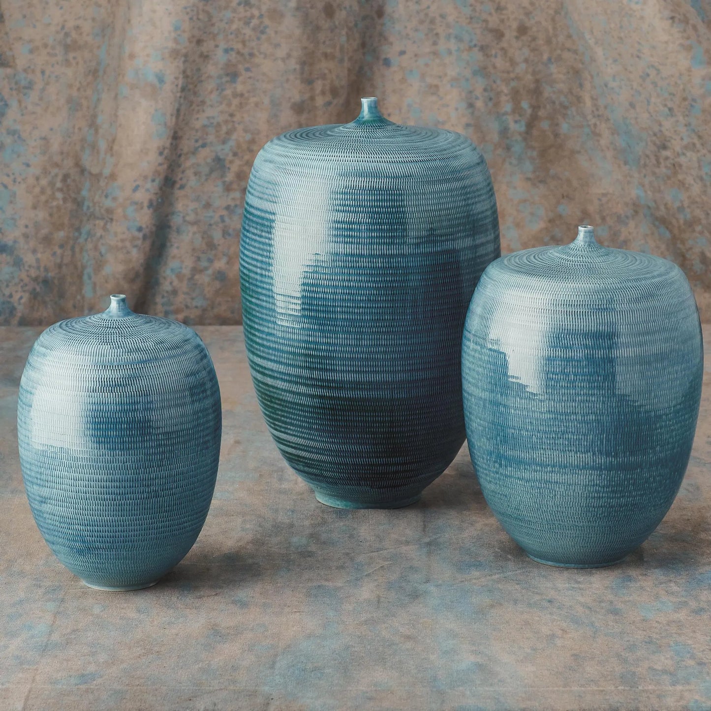 006 SR-701189,SR-701190,SR-701191 | Additional Silo | Fat Bottle by Global Views. Made from porcelain in a coastal style.