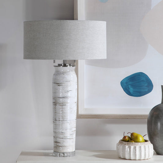 Lenta Table Lamp by Uttermost in white. Made from ceramic, iron, crystal in a transitional style.