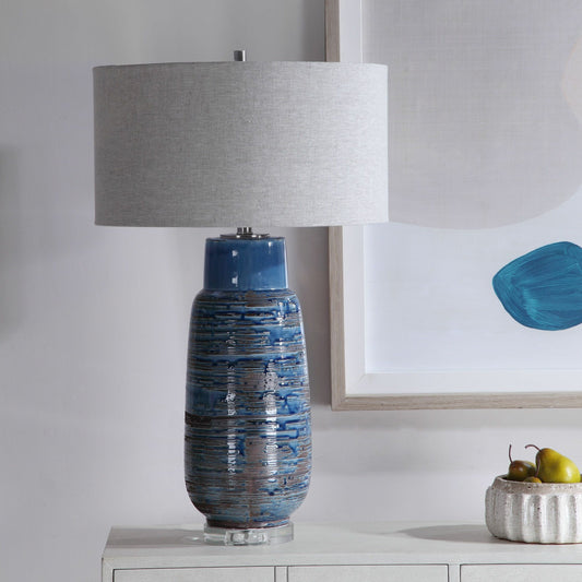 MagellanTable Lamp by Uttermost in blue. Made from ceramic, iron, crystal in a coastal style.