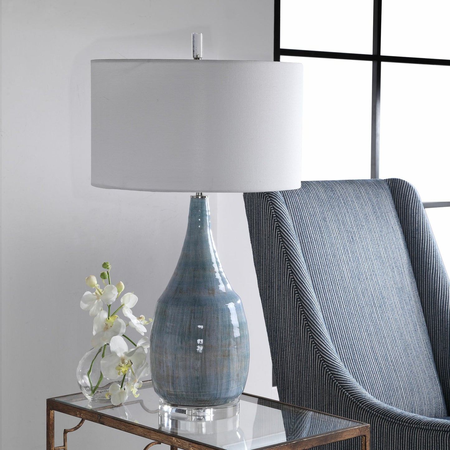 005 SR-766796 | Lifestyle | Rialta Coastal Table Lamp by Uttermost. Made from steel, ceramic, crystal in a coastal style.