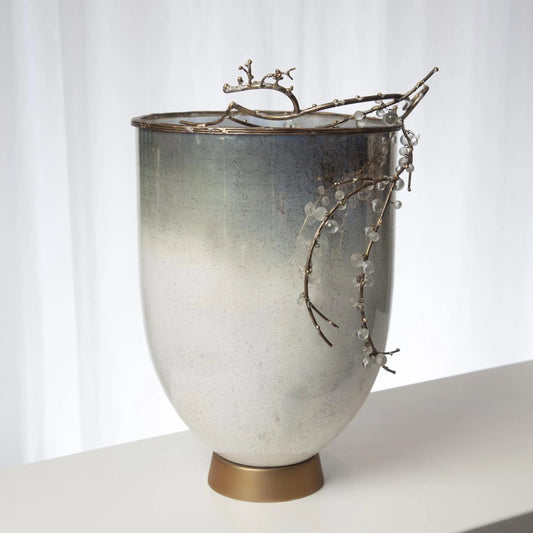 Foret Hurricane by Global Views in matte antique brass. Made from snow white finished glass, aluminum, brass, glass beads in a eclectic & global style.