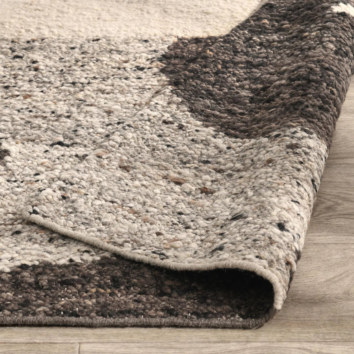 015 SI-2256256 | Closeup | Hesperia Wool Pattern Rug by Villa by Classic Home in brown. Made from 100% wool in a unique style.