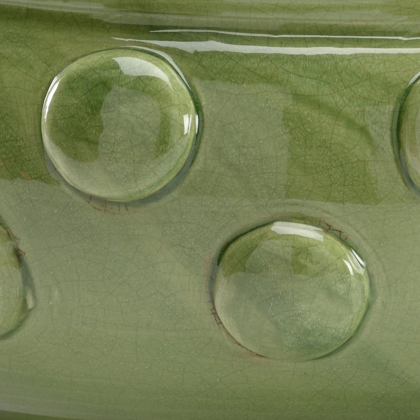 002 SR-385289 | Closeup | Elisa Centerpiece by Wildwood in green crackle glaze. Made from ceramic in a modern style.