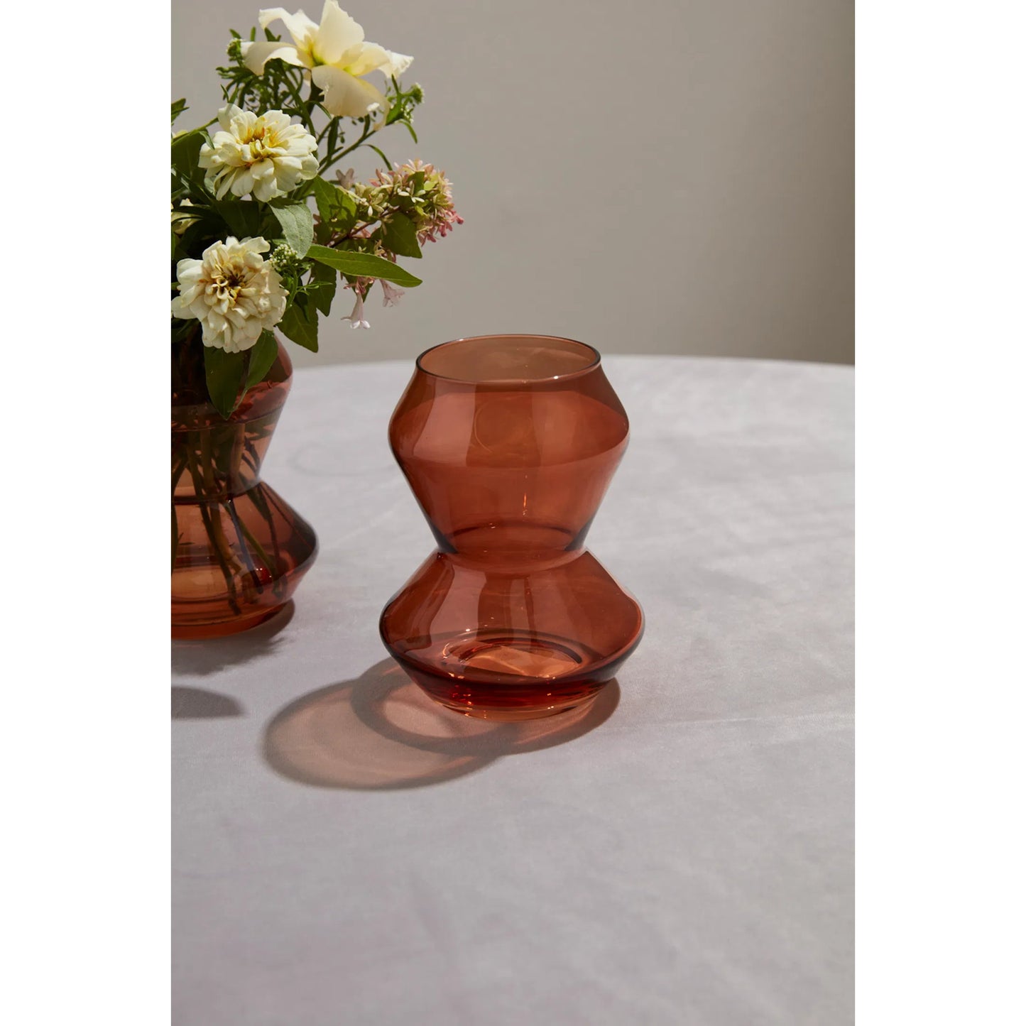 003 SI-2255209 | Lifestyle | Kigali Vase 2 (Set of 2) by Accent Decor in brown. Made from glass in a modern style.