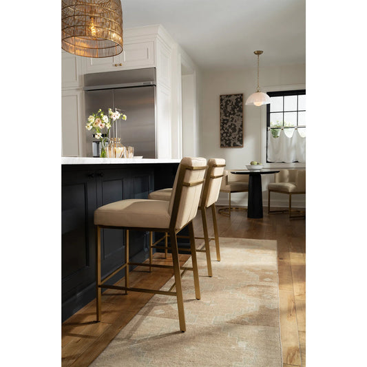 Chantal Leather Counter Stool by Regina Andrew in cappuccino. Made from leather in a traditional style.