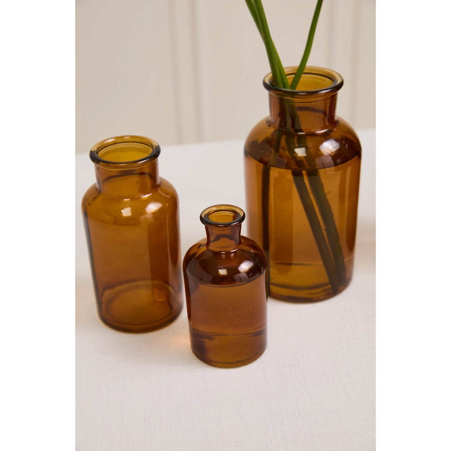006 SI-2539336 | Lifestyle | Amber Billie Bottle by Accent Decor in amber. Made from glass in a unique style.