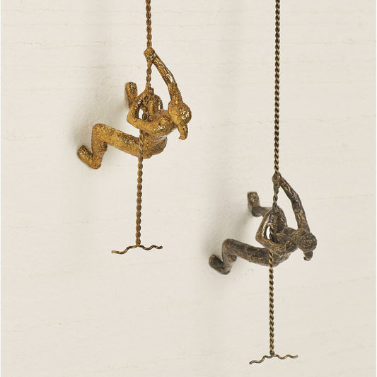 Climbing Woman by Global Views. Made from cast iron in a modern style.