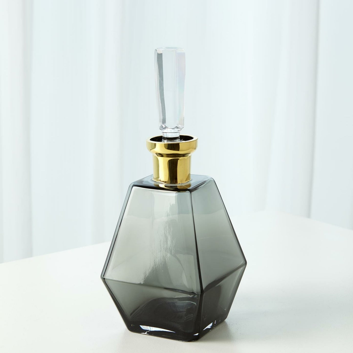 002 SR-701010 | Lifestyle | Cone Decanter by Global Views. Made from glass in a transitional style.