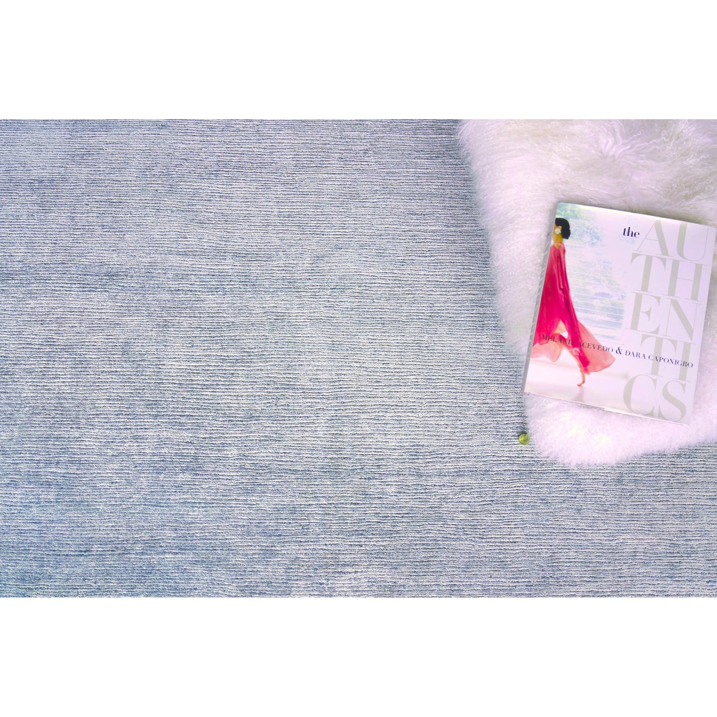 055 SI-1827863,SI-1827864 | Lifestyle | Crush Rug by Exquisite Rugs. Made from bamboo silk in a unique style.