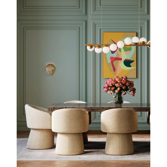 Alexine Wall Sconce by Currey and Company in antique brass. Made from brass, iron in a modern style.