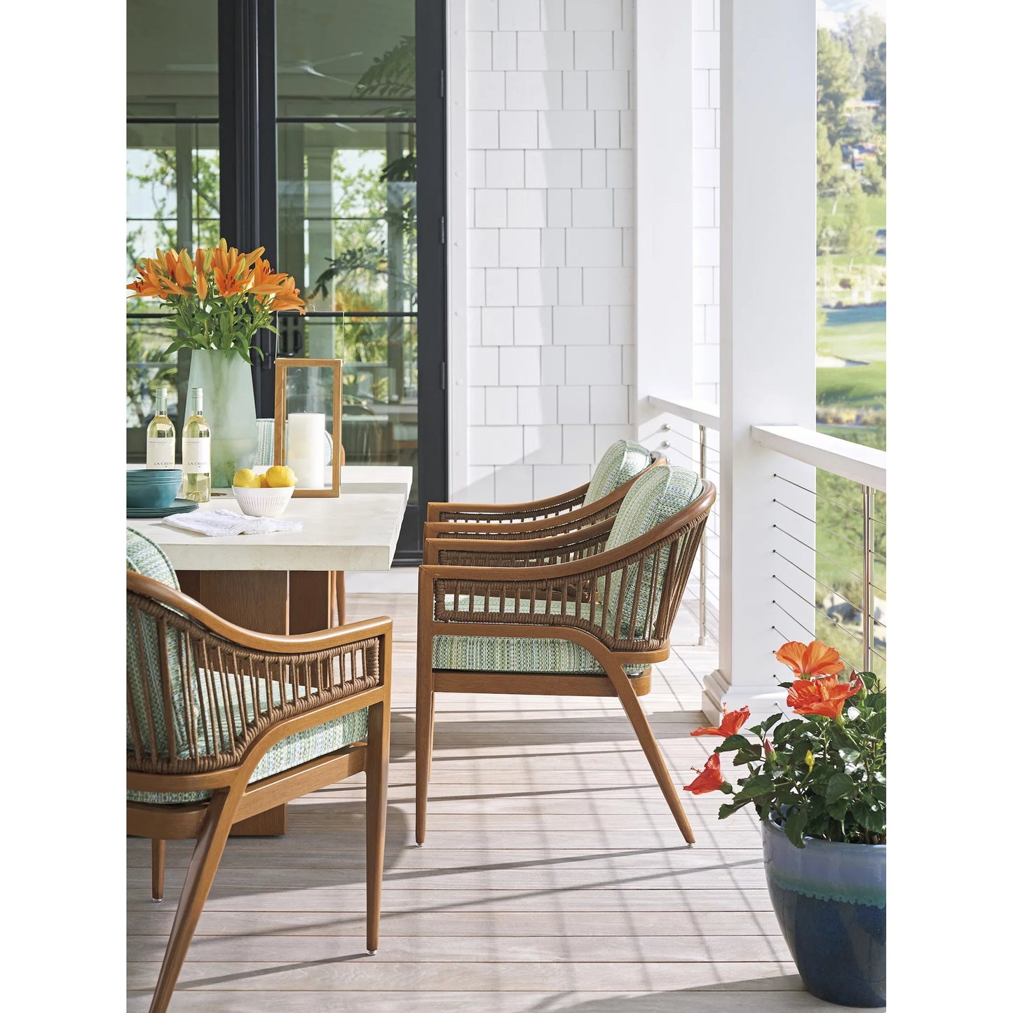 003 SI-2371224 | Lifestyle | Palm Desert Poolside Arm Dining Chair by Tommy Bahama Outdoor in 3350 dark brown. Made from unique in a unique style.