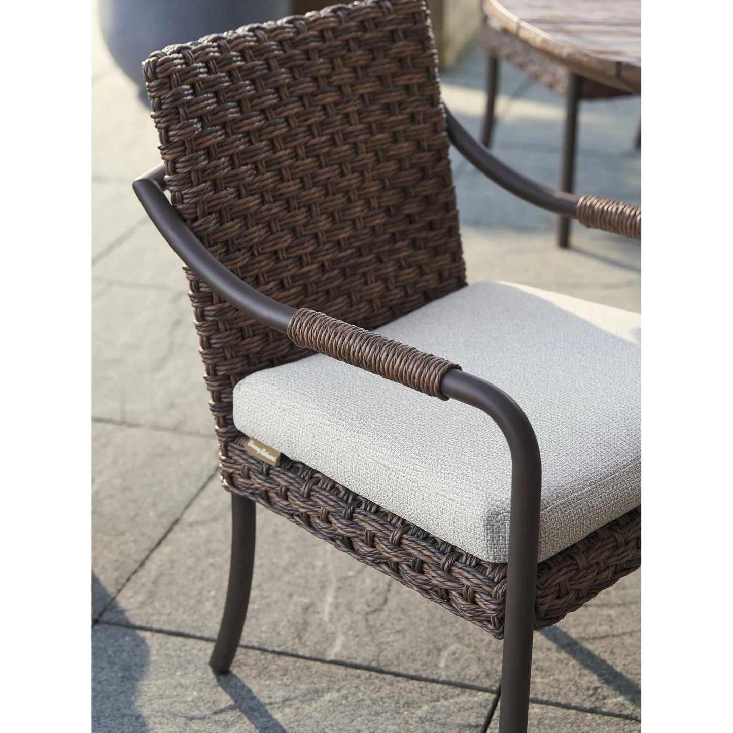 005 SI-2242592 | Closeup | Kilimanjaro Dining Arm Chair by Tommy Bahama Outdoor in tobacco. Made from unique in a unique style.