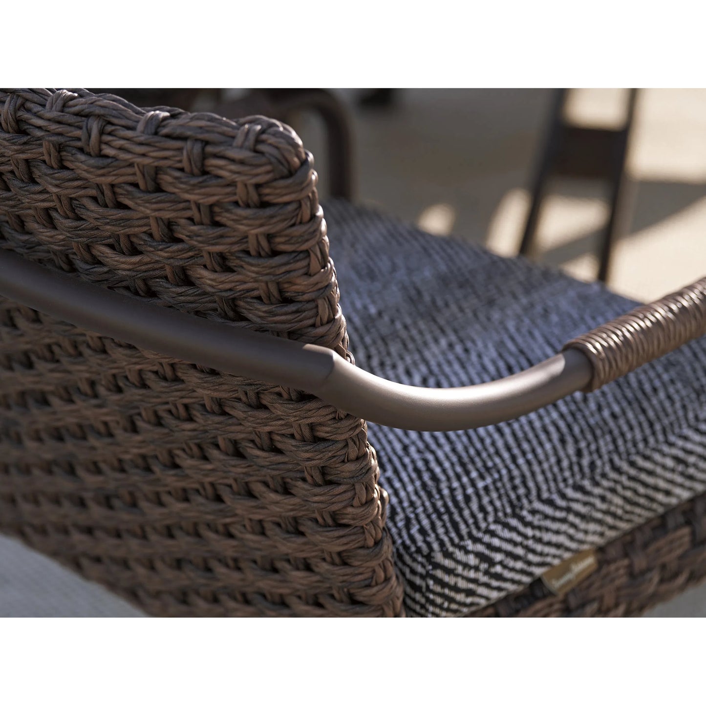 004 SI-2242592 | Closeup | Kilimanjaro Dining Arm Chair by Tommy Bahama Outdoor in tobacco. Made from unique in a unique style.