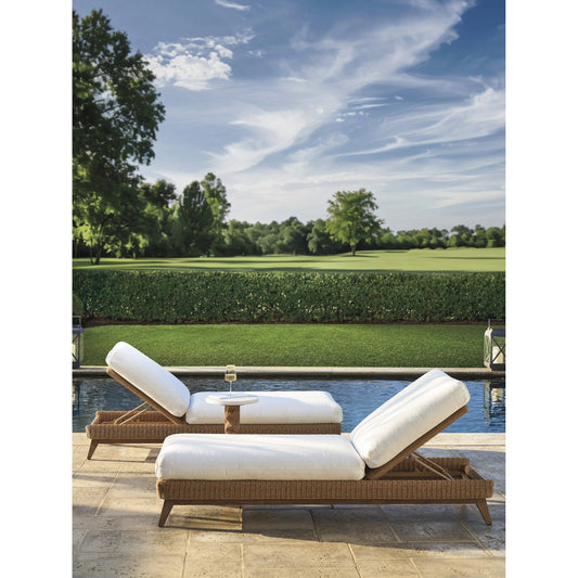 Isle of Palms Chaise Lounge by Tommy Bahama Outdoor in white, ivory and brown. Made from teak, rattan, fabric in a unique style.