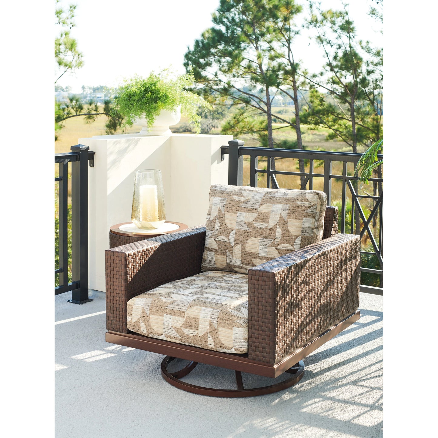 004 SI-1962915 | Lifestyle | Abaco Swivel Lounge Chair by Tommy Bahama Outdoor in english walnut. Made from unique in a transitional style.