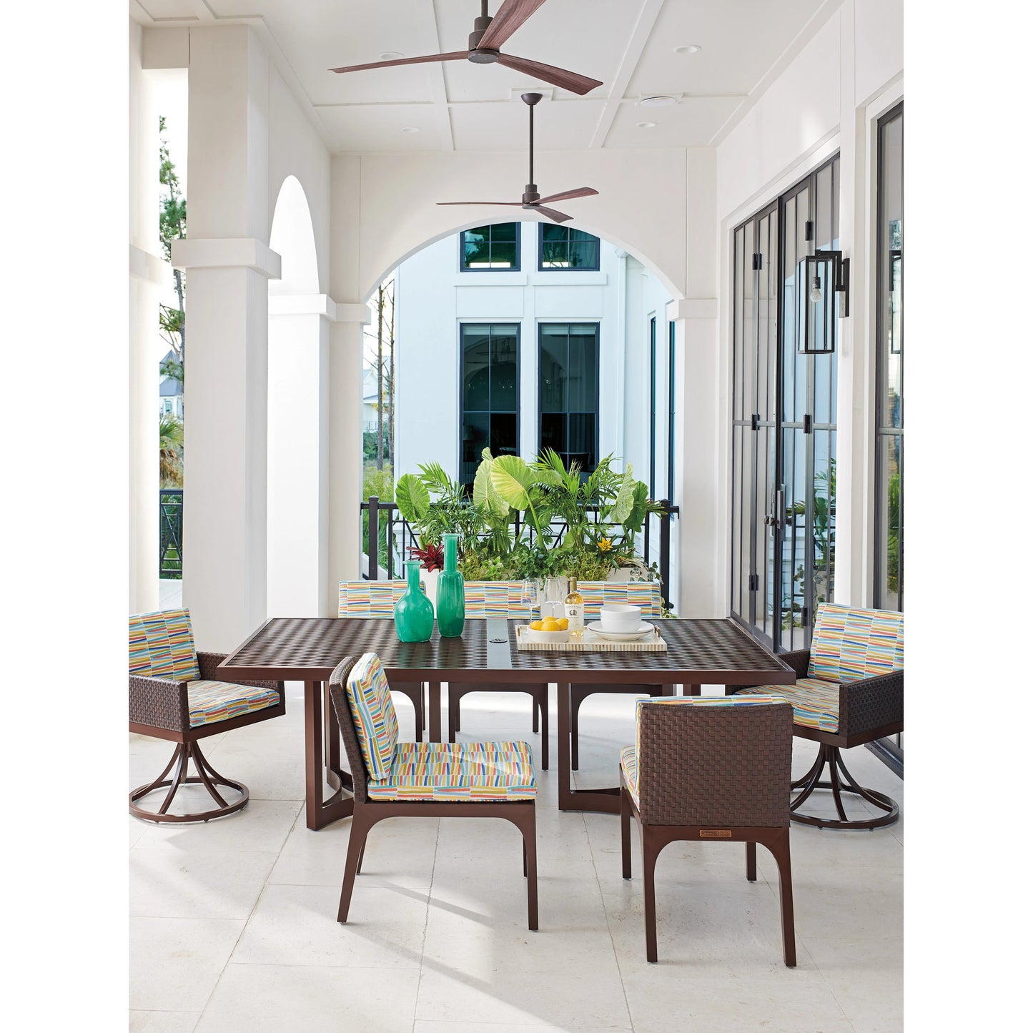 005 SI-1962918 | Lifestyle | Abaco Swivel Rocker Dining Chair by Tommy Bahama Outdoor in english walnut. Made from unique in a modern style.