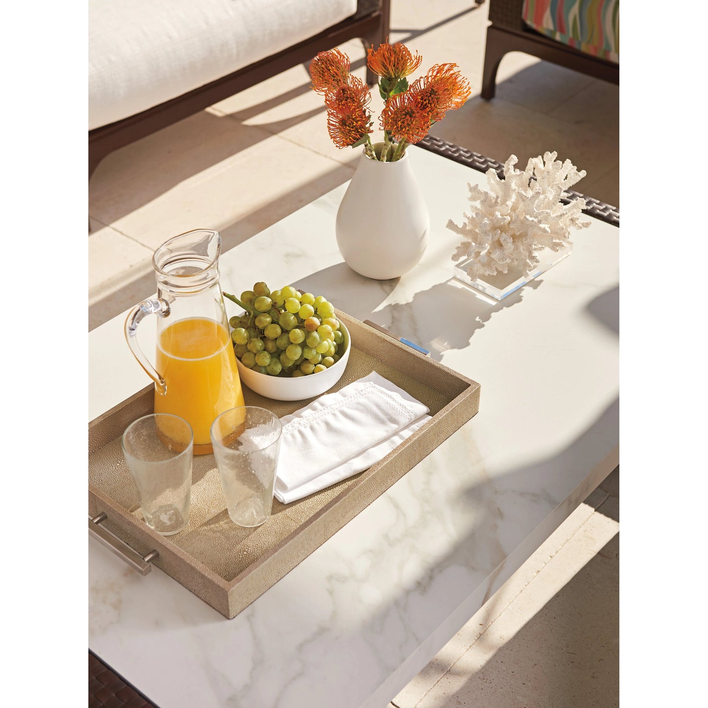 003 SI-1962930 | Lifestyle | Abaco Rectangular Cocktail Table by Tommy Bahama Outdoor in brown, white, gray and english walnut. Made from unique in a modern style.