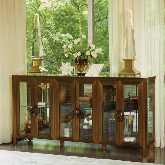 Apothecary Console Cabinet by Global Views in dark brass. Made from poplar, beveled clear glass in a transitional style.