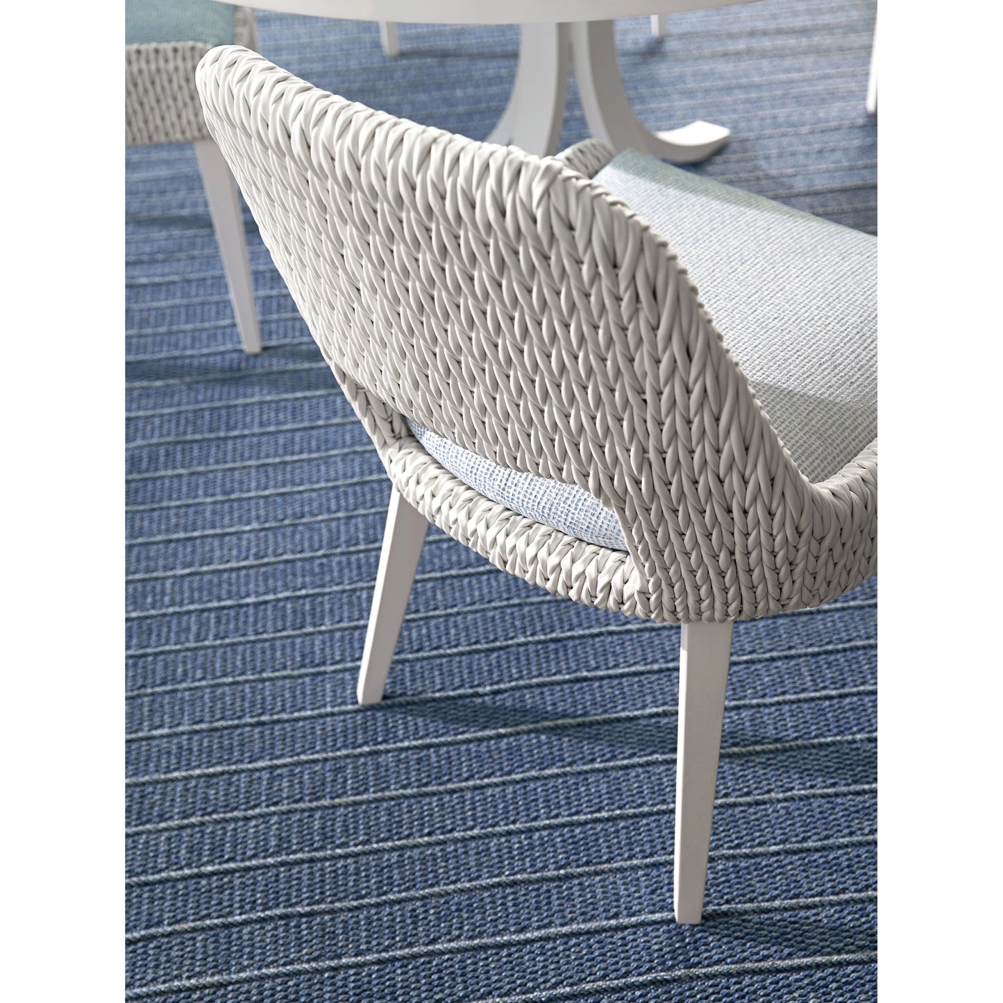 003 SI-2013320 | Closeup | Ocean Breeze Promenade Occasional Dining Chair by Tommy Bahama Outdoor in pearl white. Made from unique in a coastal style.