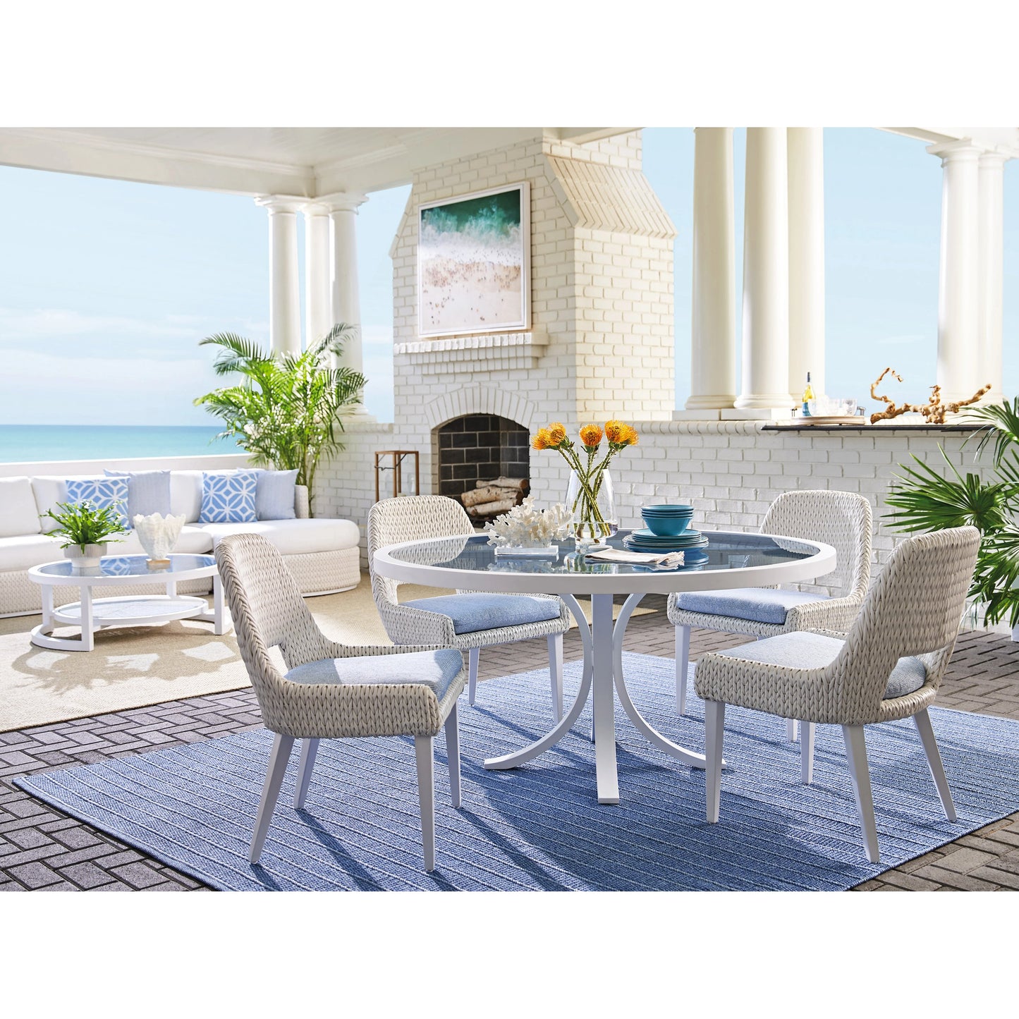 002 SI-2013328 | Lifestyle | Ocean Breeze Promenade Round Dining Table by Tommy Bahama Outdoor in white. Made from unique in a coastal style.