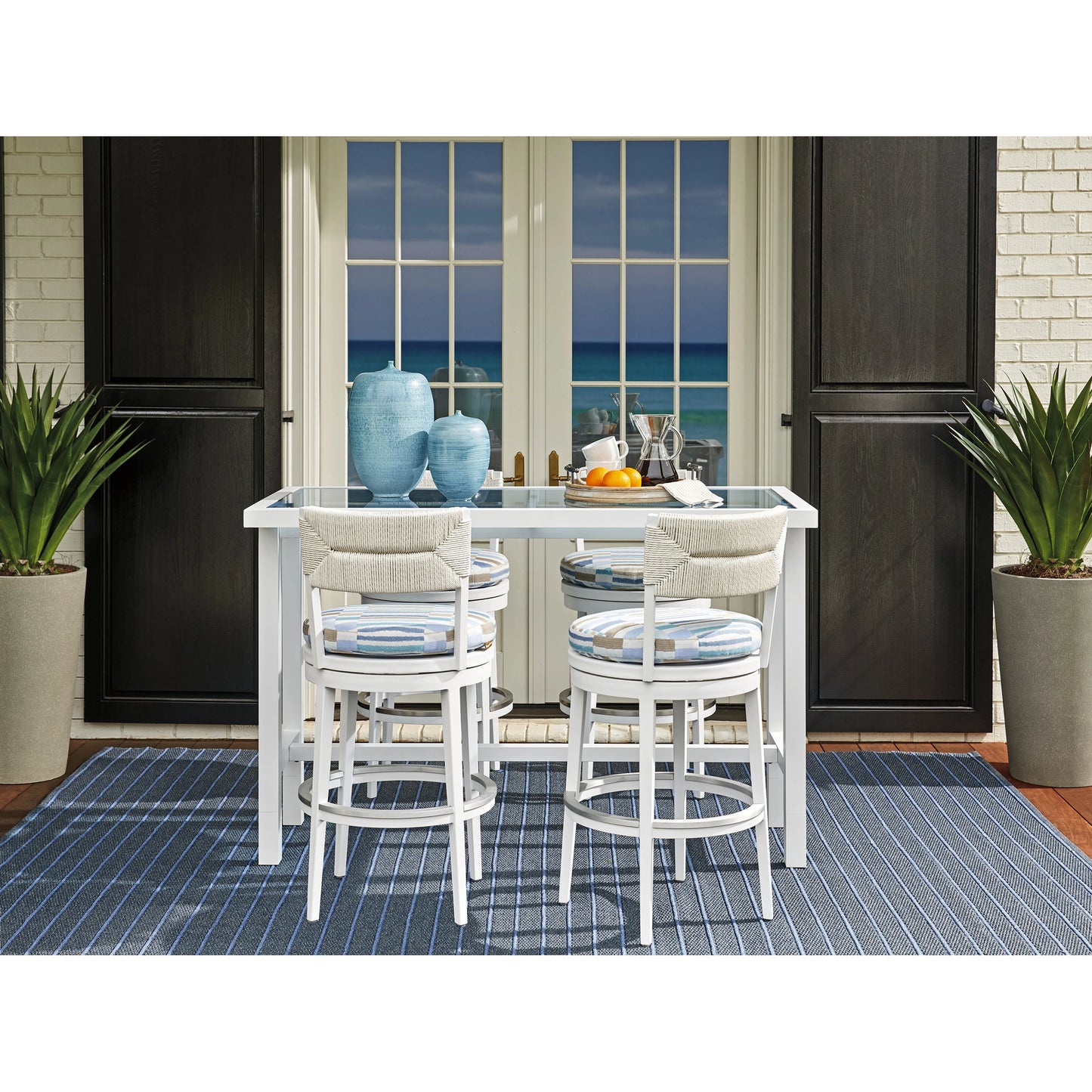 004 SI-2013318 | Lifestyle | Ocean Breeze Promenade Swivel Bar Stool by Tommy Bahama Outdoor in pearl white. Made from unique in a coastal style.