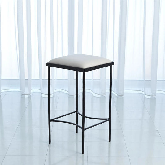 Hammered Counter Stool by Global Views in rustic gun metal powder coat. Made from iron in a transitional style.