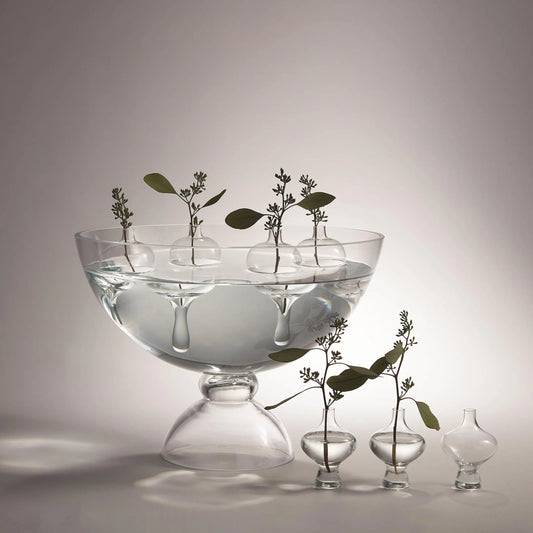 Mini Floating Droplet Vase by Global Views. Made from glass in a modern style.