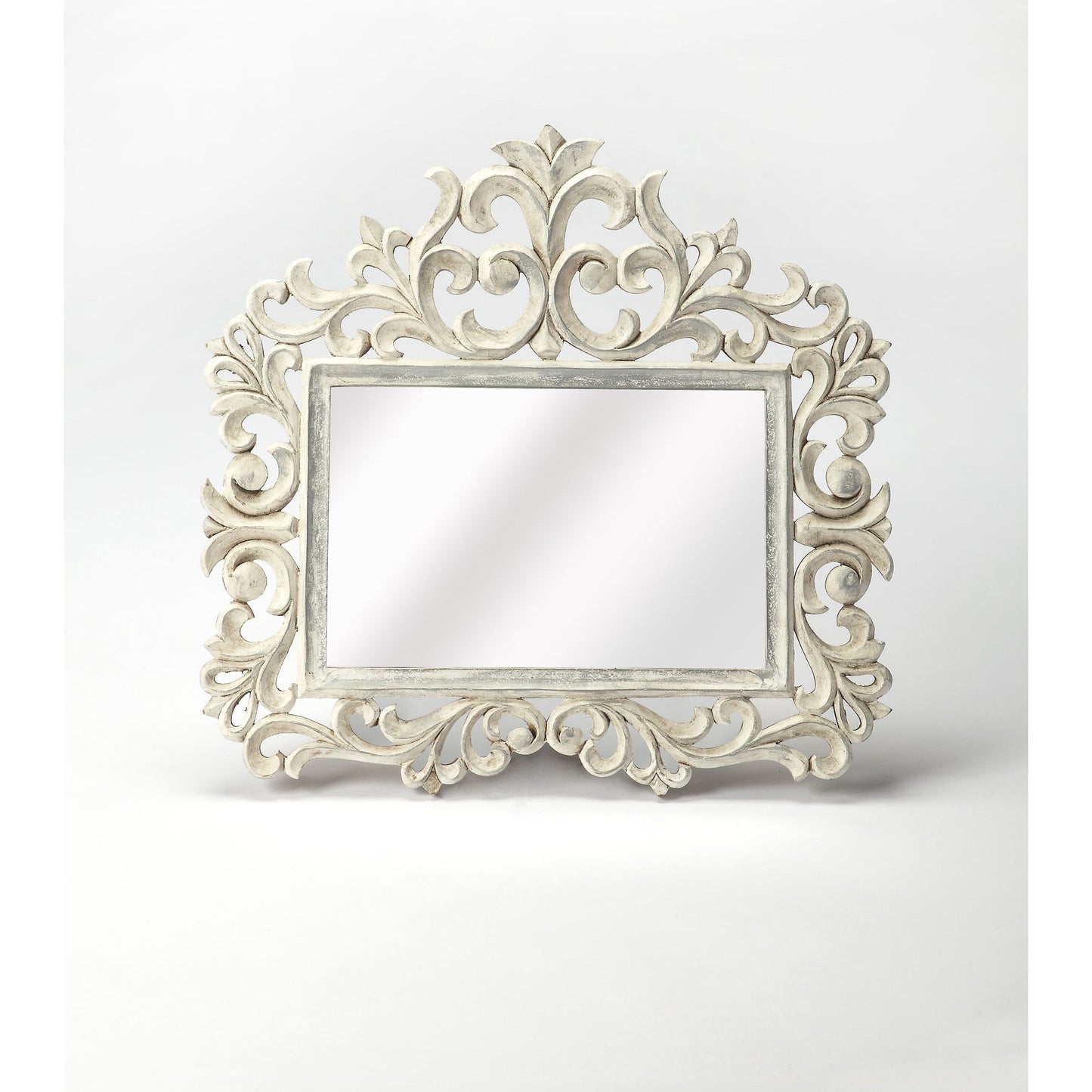 002 O-BUTLER-3681290 | Additional Silo | Favart Carved Wall Mirror by Butler Specialty Company in white and artifacts. Made from mdf, mirrored glass in a traditional style.