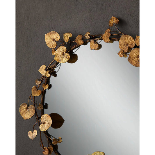 Vinna Mirror by Currey and Company in antique brass, mirror. Made from cast aluminum, wood, glass in a cottage & farmhouse style.