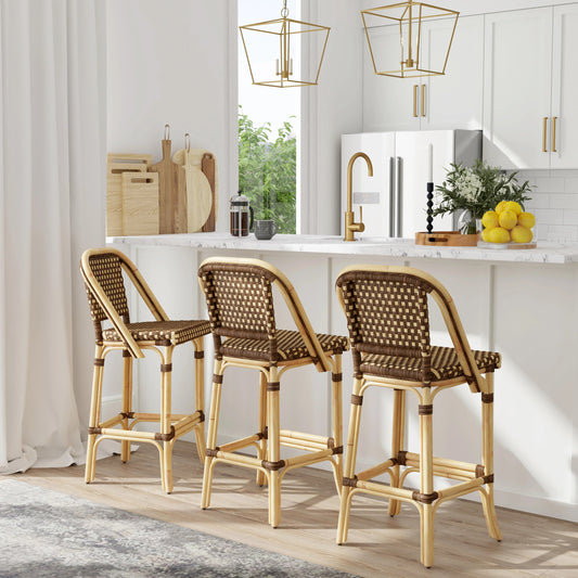 Lila Rattan Barstool by Butler Specialty Company in light brown and brown. Made from rattan, woven plastic (carrie pattern) in a modern style.