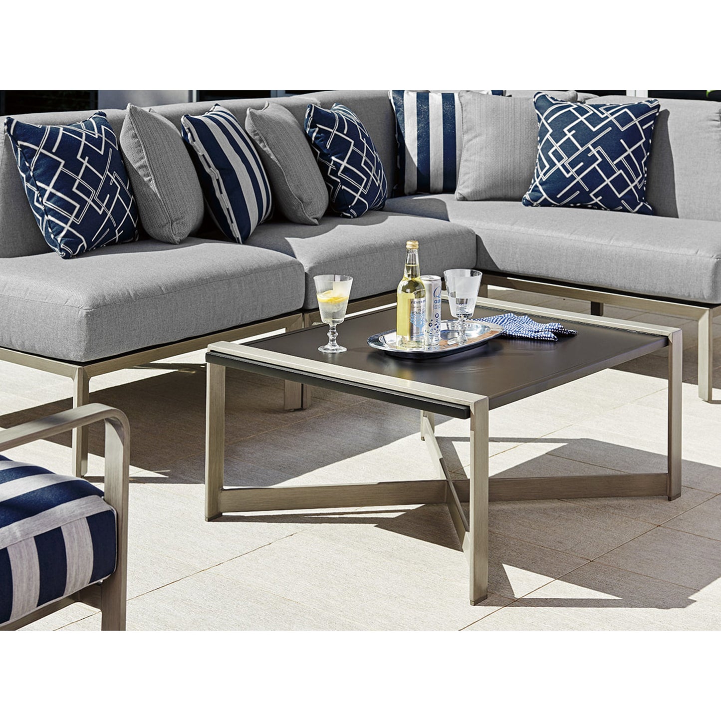 003 SR-836625 | Lifestyle | Del Mar Cocktail Table by Tommy Bahama Outdoor. Made from unique in a modern style.