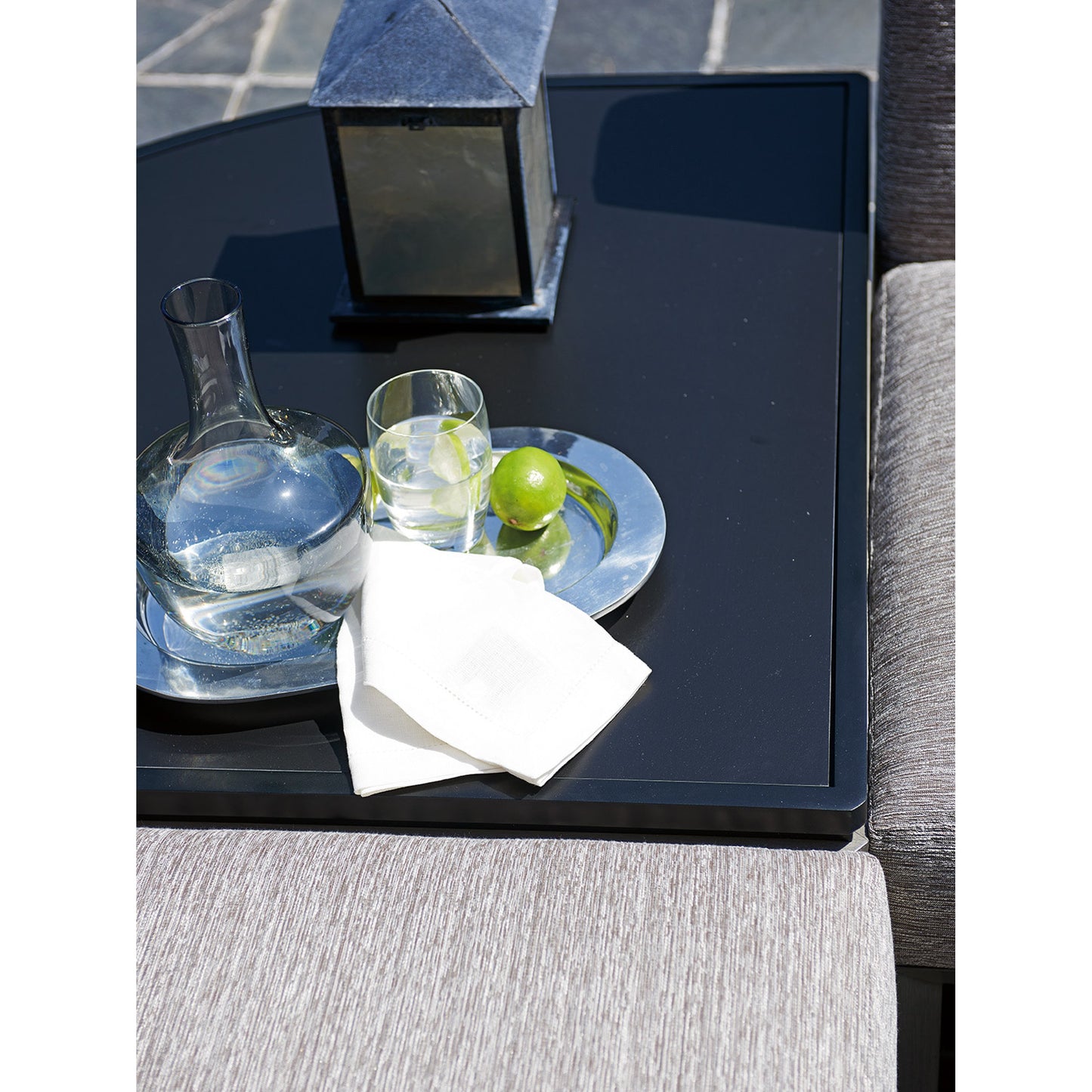 006 SR-836771 | Lifestyle | Del Mar Sectional Corner Table by Tommy Bahama Outdoor in black. Made from unique in a modern style.