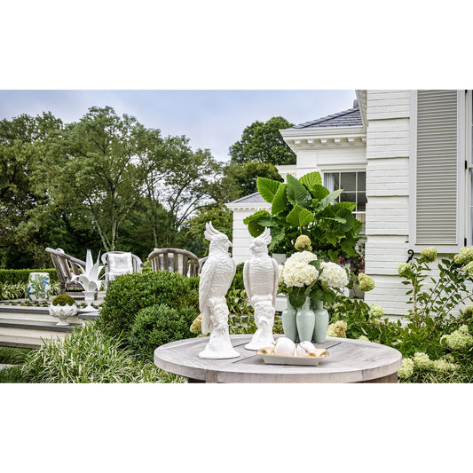 Cockatoos (Set of 2) by Chelsea House in white glaze. Made from hand painted ceramic in a coastal style.