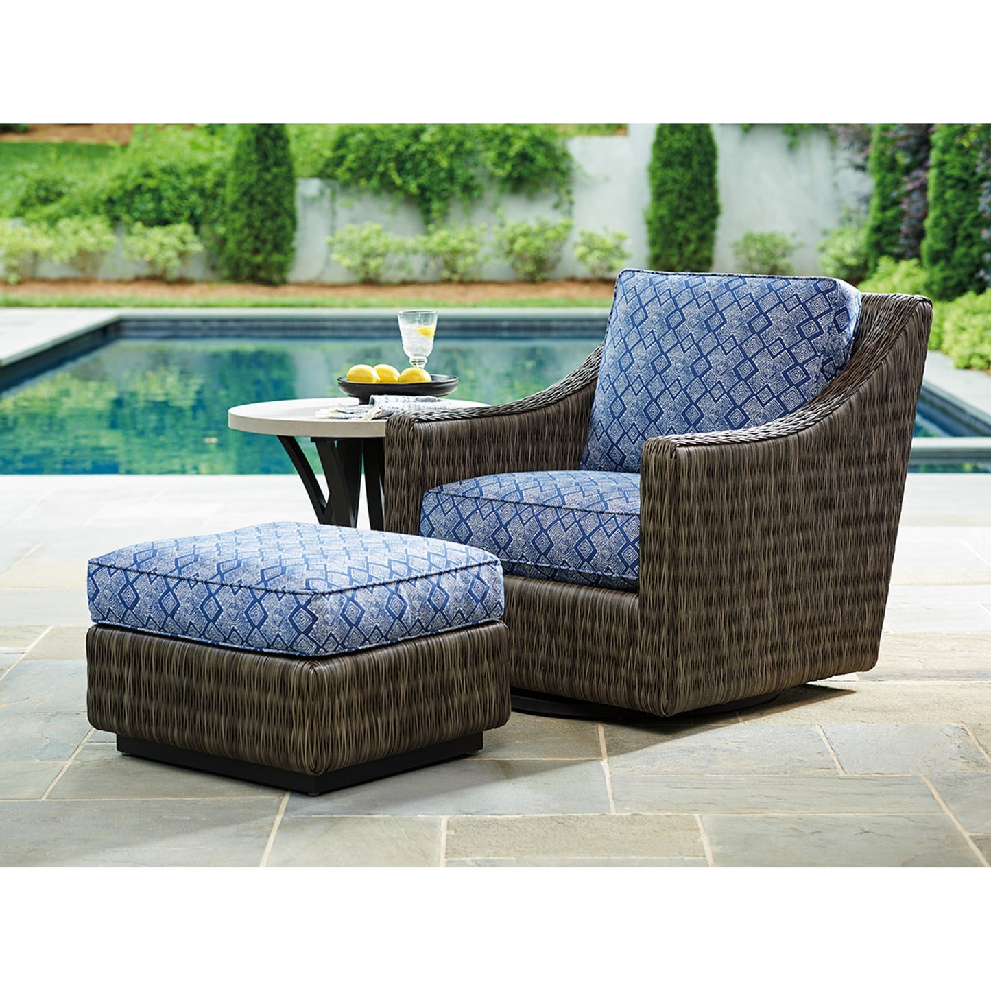 003 SR-836813 | Lifestyle | Cypress Point Ocean Terrace Swivel Glider Lounge Chair by Tommy Bahama Outdoor in blue. Made from unique in a coastal style.