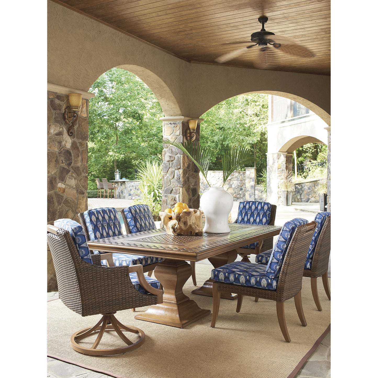 006 SR-836775 | Lifestyle | Harbor Isle Side Dining Chair by Tommy Bahama Outdoor in blue. Made from unique in a coastal style.