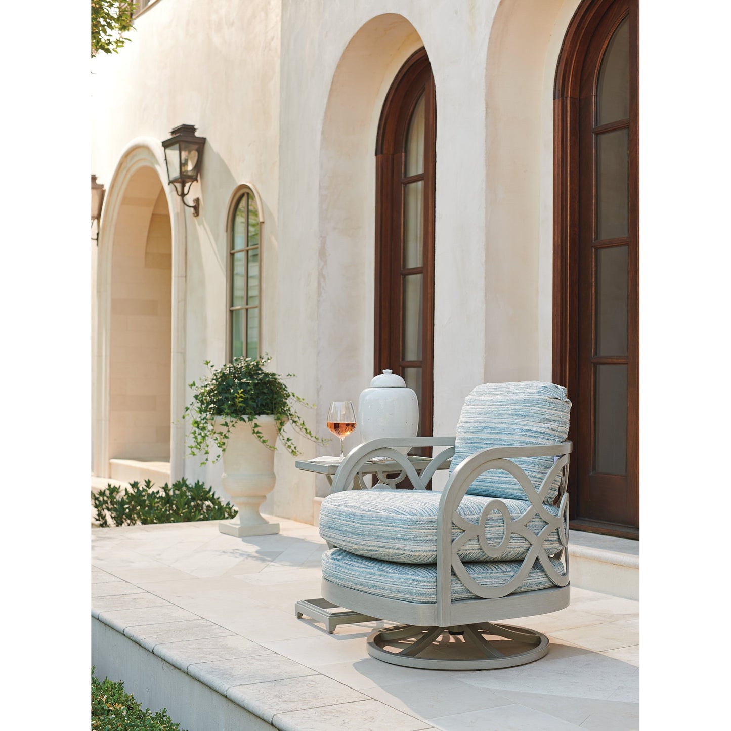 003 SI-1770904 | Lifestyle | Silver Sands Swivel Chair by Tommy Bahama Outdoor in gray oyster shell. Made from unique in a coastal style.
