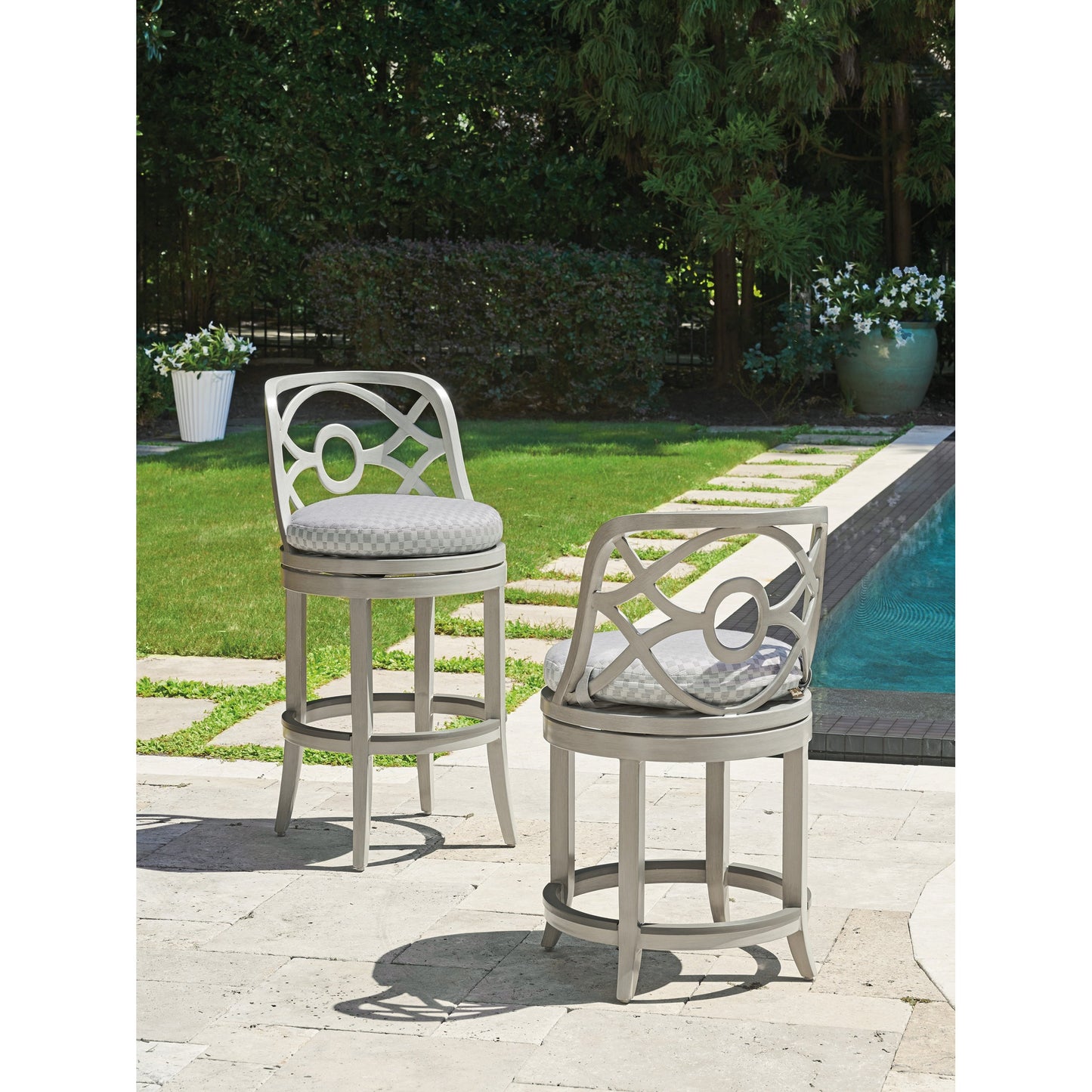 004 SI-1770917 | Lifestyle | Silver Sands Swivel Counter Stool by Tommy Bahama Outdoor in gray oyster shell. Made from unique in a transitional style.