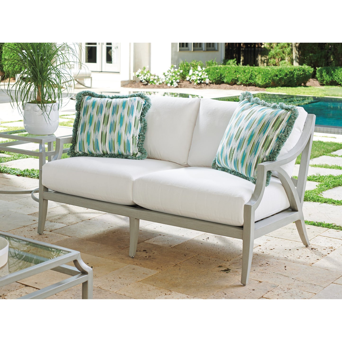 002 SI-1770903 | Lifestyle | Silver Sands Loveseat by Tommy Bahama Outdoor in gray oyster shell. Made from unique in a coastal style.