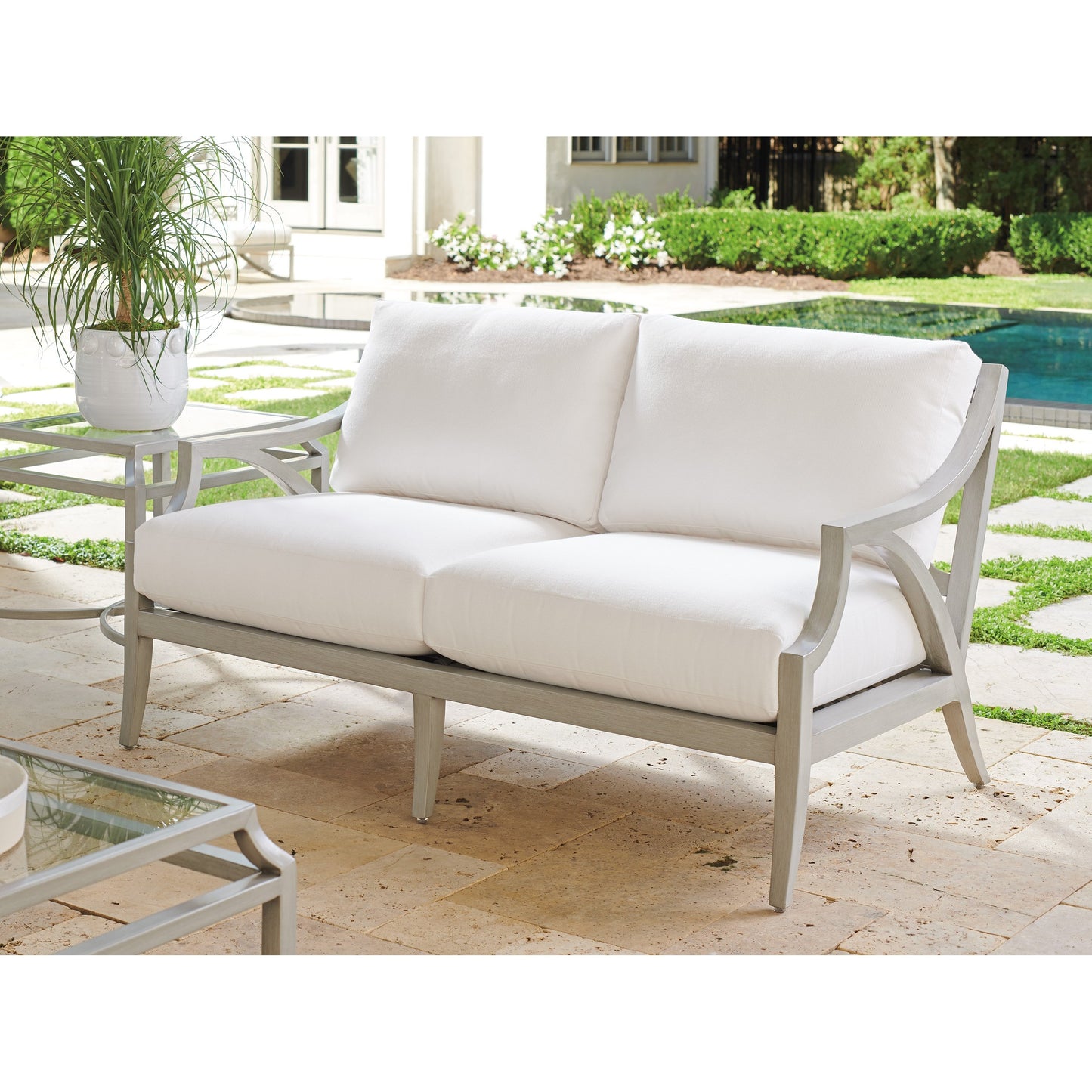 003 SI-1770902 | Lifestyle | Silver Sands Loveseat by Tommy Bahama Outdoor in gray oyster shell. Made from unique in a transitional style.