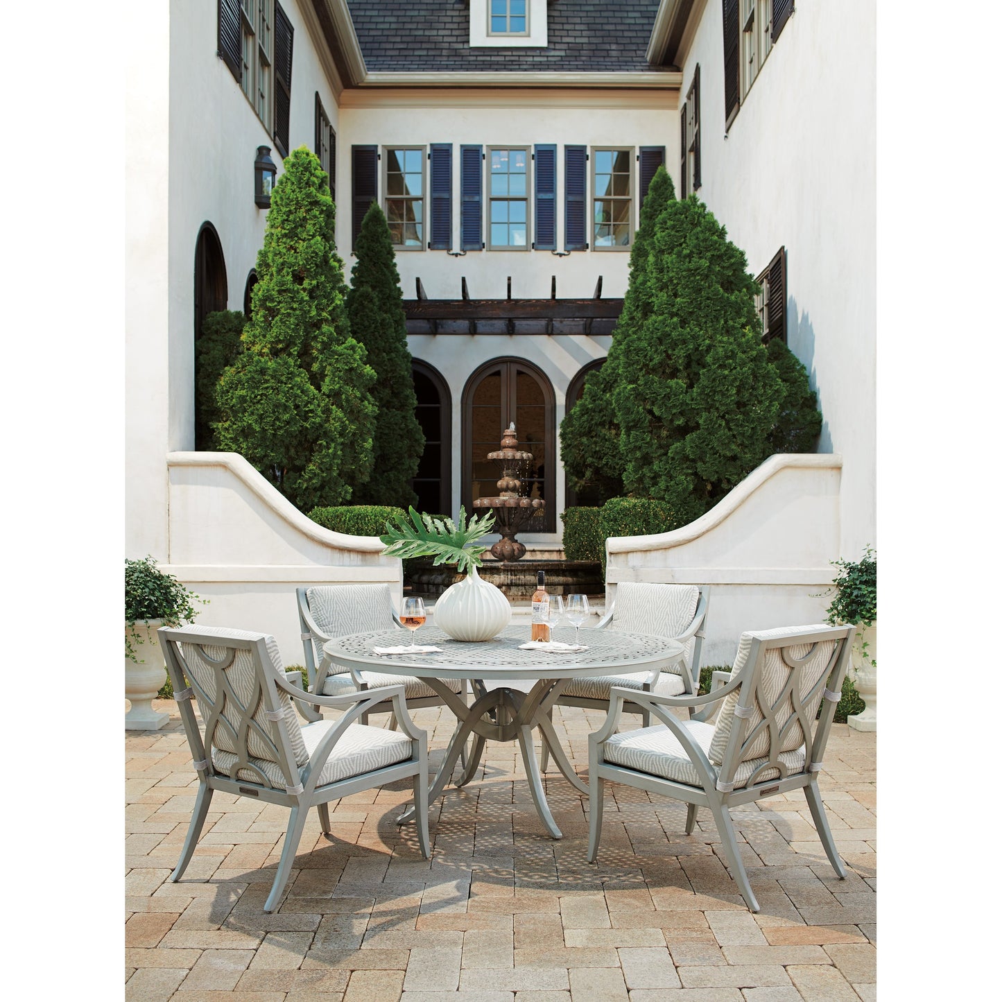 003 SI-1770911 | Lifestyle | Silver Sands Dining Table by Tommy Bahama Outdoor in gray oyster shell. Made from unique in a transitional style.