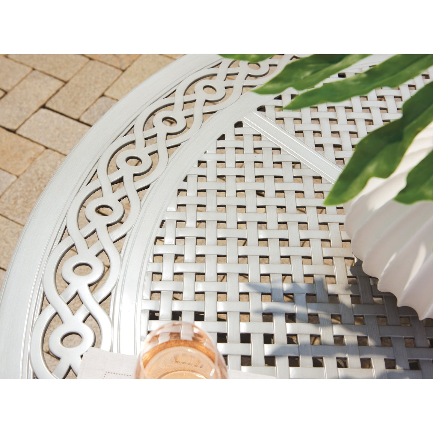 004 SI-1770911 | Lifestyle | Silver Sands Dining Table by Tommy Bahama Outdoor in gray oyster shell. Made from unique in a transitional style.