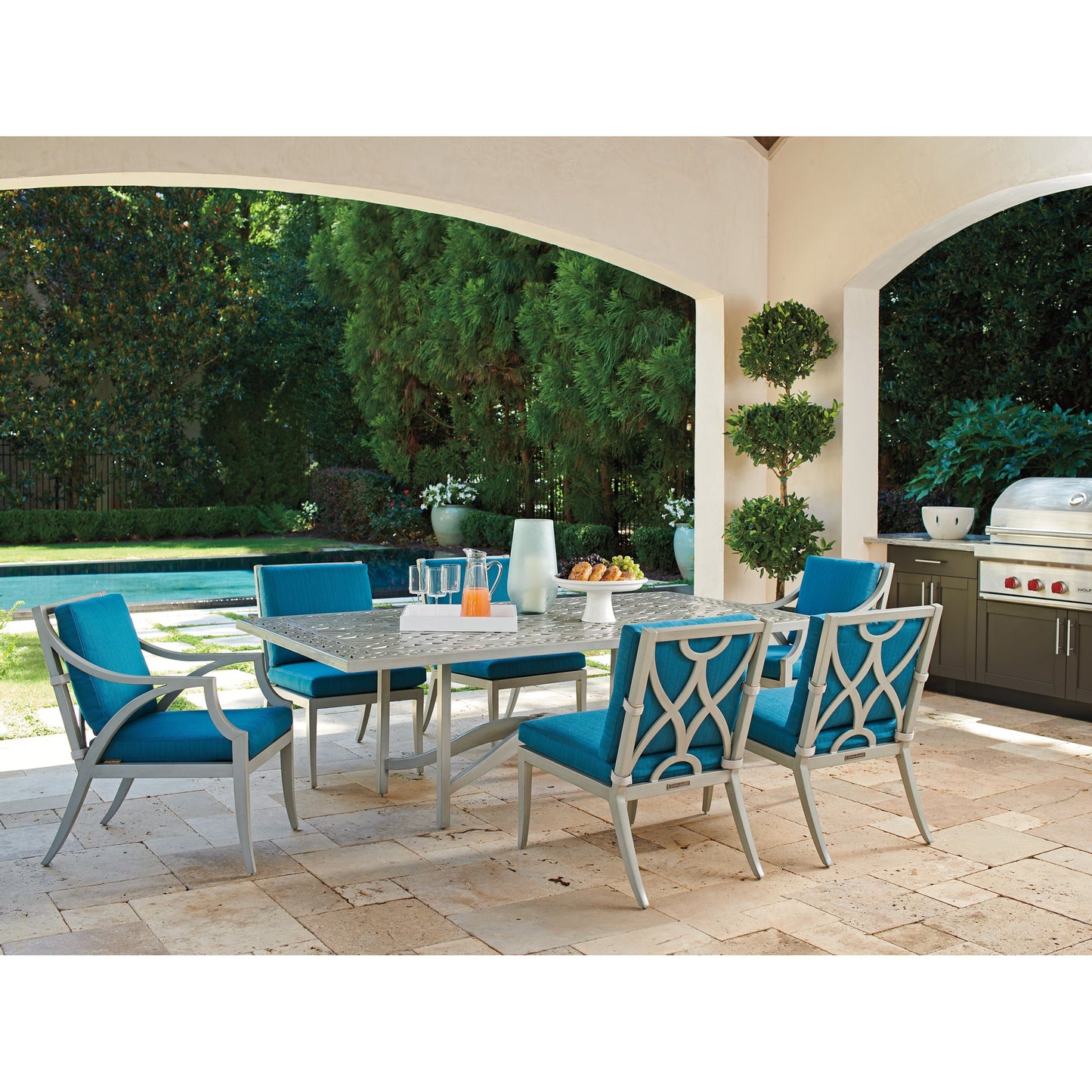 004 SI-1770897 | Lifestyle | Silver Sands Dining Arm Chair by Tommy Bahama Outdoor in gray oyster shell. Made from unique in a coastal style.