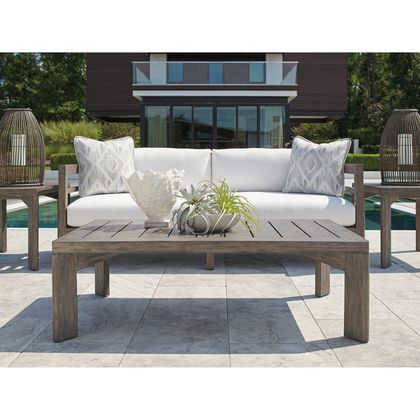 003 SI-1770884 | Lifestyle | La Jolla Cocktail Table by Tommy Bahama Outdoor in vintage. Made from unique in a coastal style.
