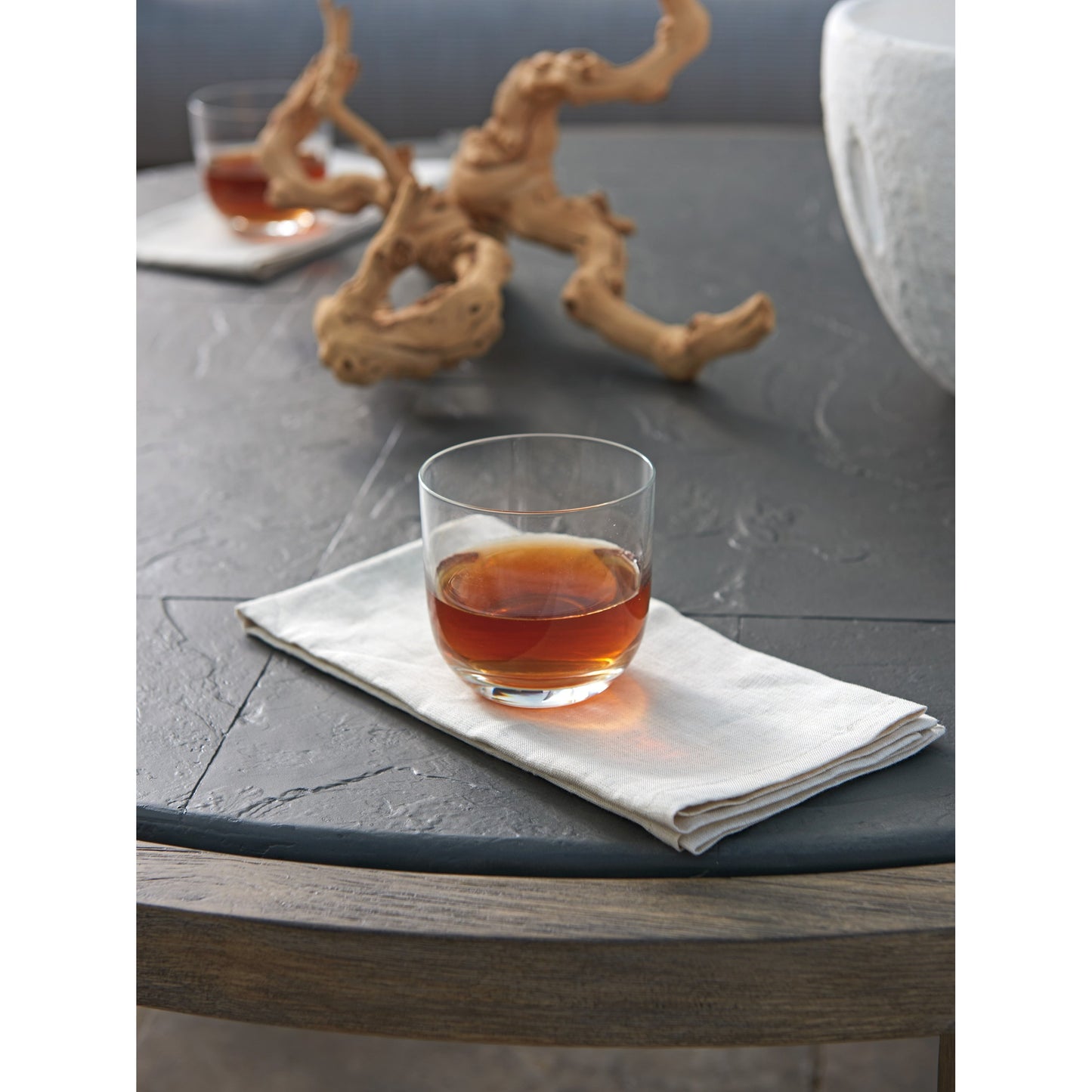 005 SI-1770887 | Lifestyle | La Jolla Cocktail Table by Tommy Bahama Outdoor in vintage. Made from unique in a transitional style.